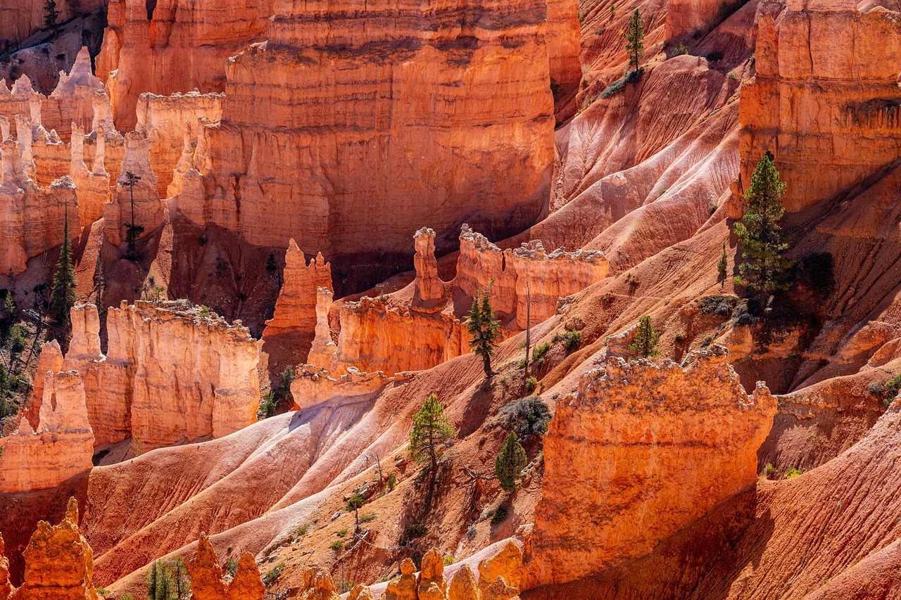 Meandering Green River cutting through deep red sandstone canyon walls near Moab, Utah.